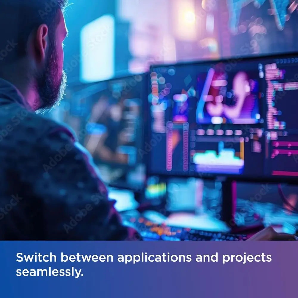 Person working at a computer with multiple screens in a blurred cityscape background