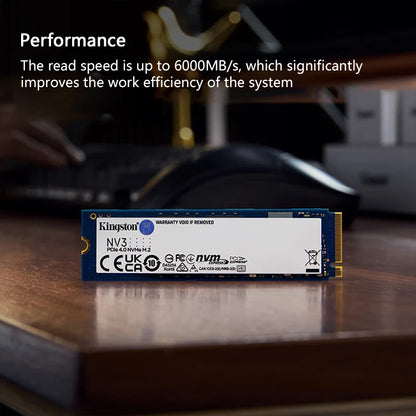 Kingston NV3 SSD on a desk with text about read speed and system efficiency.