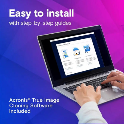 Laptop with Acronis True Image software on a purple and blue gradient background