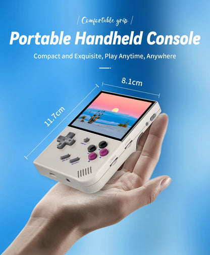 Portable handheld console held in a hand with a blue background